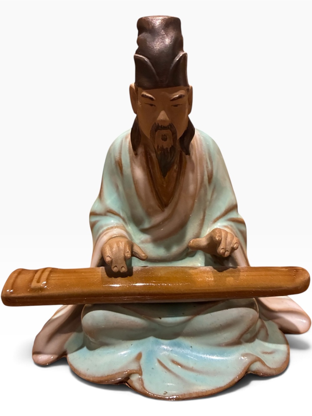 Vintage Shwian Chinese Mudman ceramic figurine playing instrument.